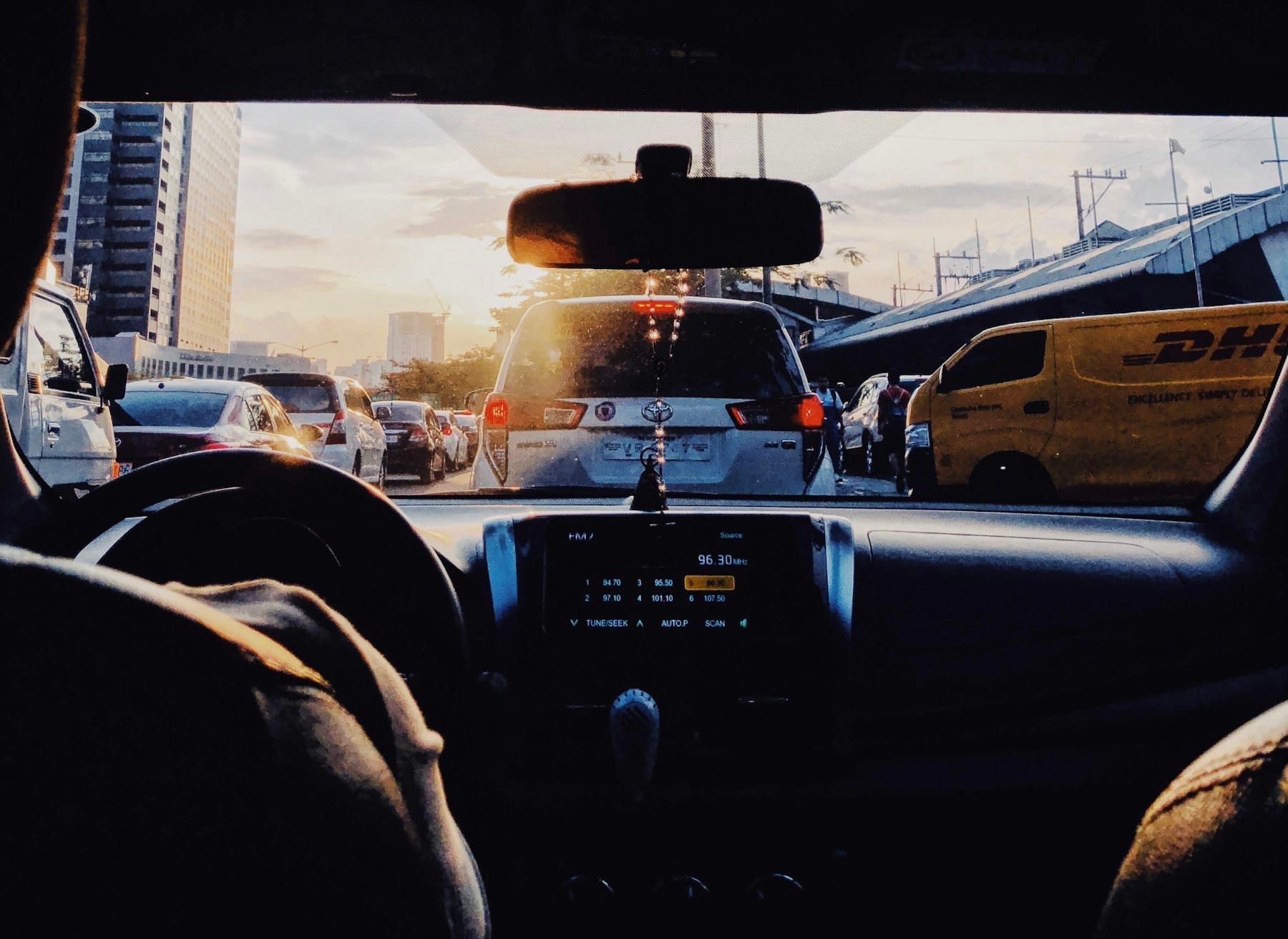 View from inside a car driving in Metro Manila traffic